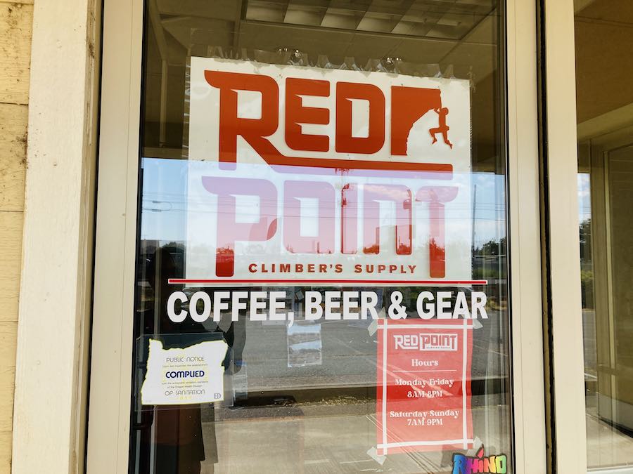 Red Point shop door - coffee, bear, and gear